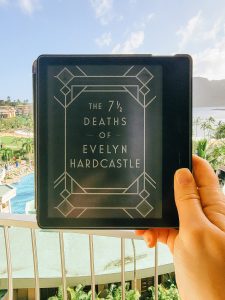 7 1/2 Deaths of Evelyn Hardcastle on hotel balcony overlooking ocean